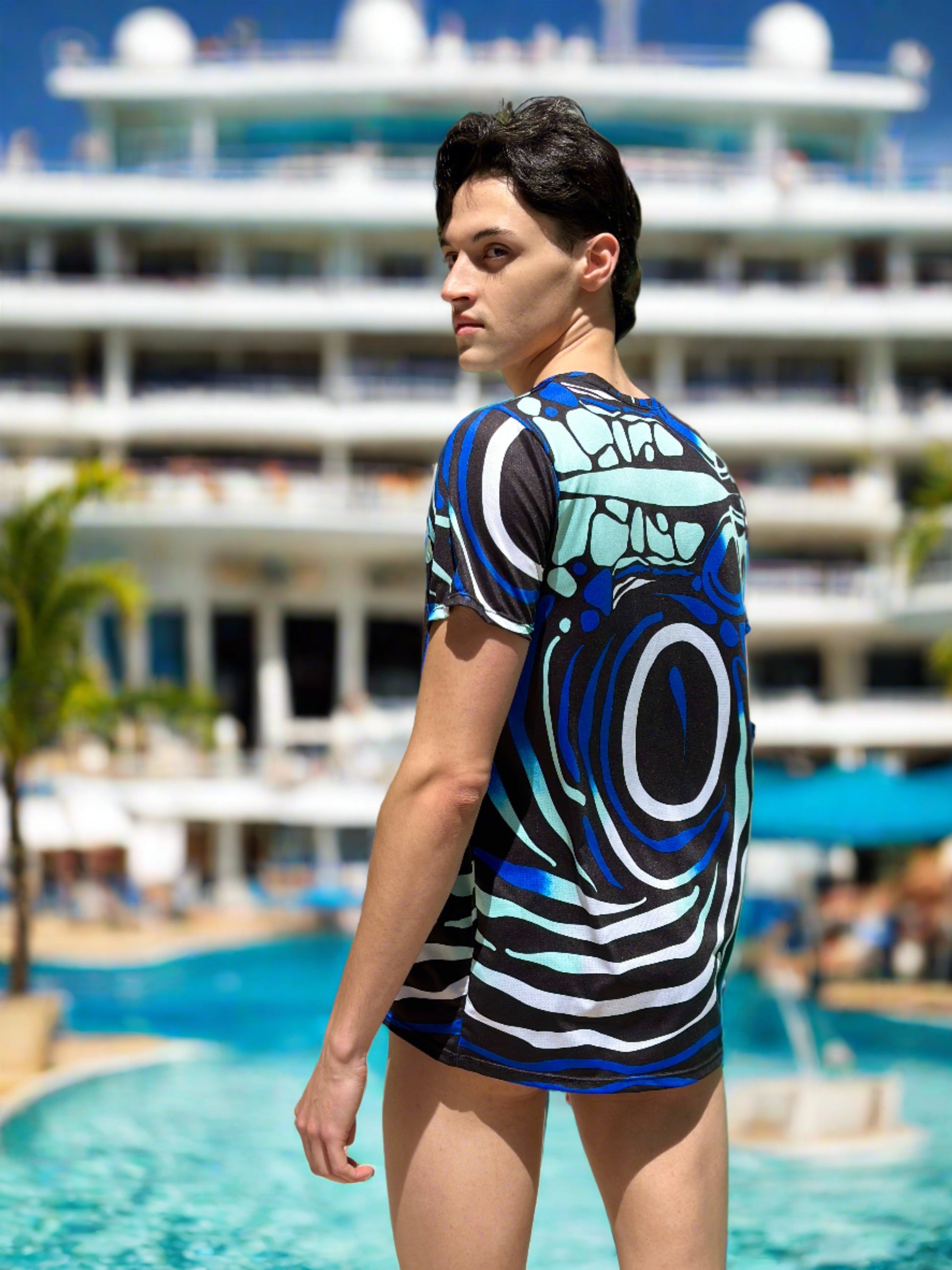 Our Angelfish Swim Brief for men and our coordinating Sport Shirt. The suit has a Speedo style cut.